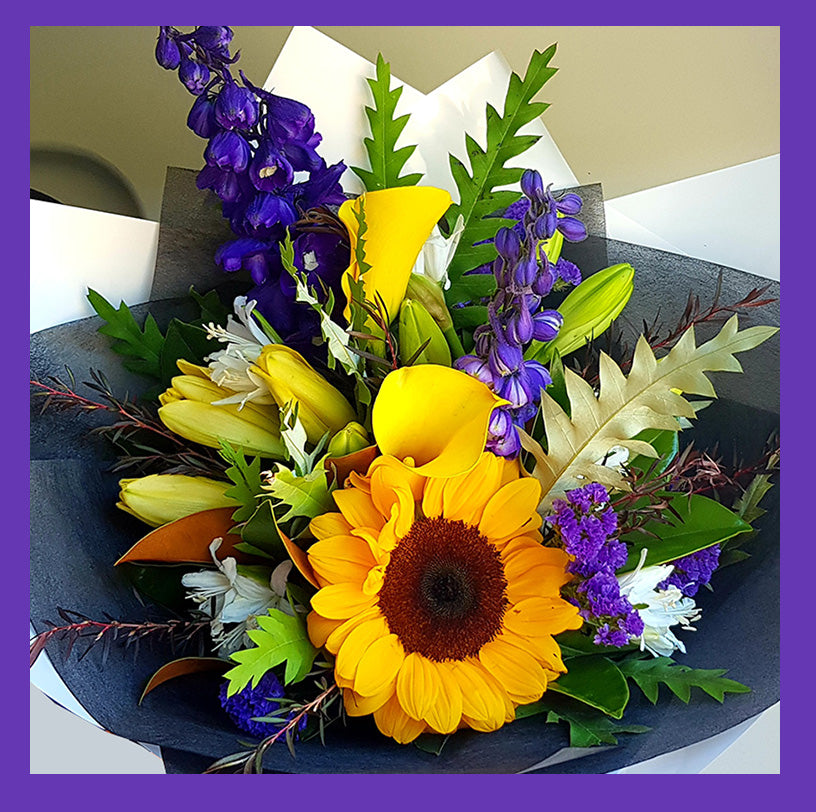 Morning Sunrise bouquets with beautiful yellow and purple flowers