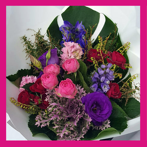 vibrant bouquet of pink and purple flowers 